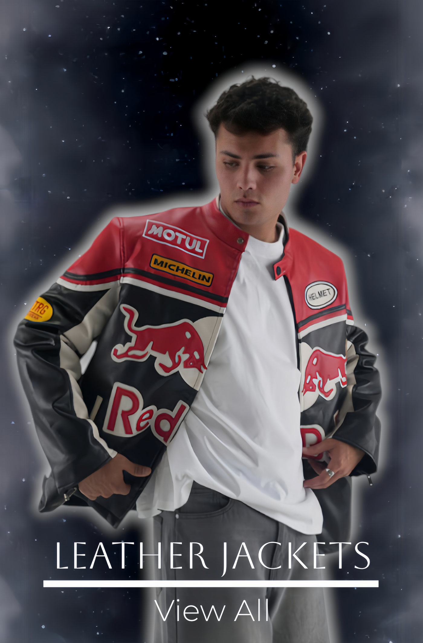 Boy wearing a red and black leather jacket with Redbull brand logos on a dark background