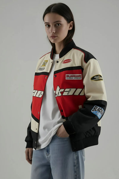 Side profile of Red BlackAir Jacket showing baggy sleeves and oversized fit.