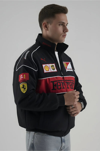 model wearing black ferrari F1 jacket giving side pose 