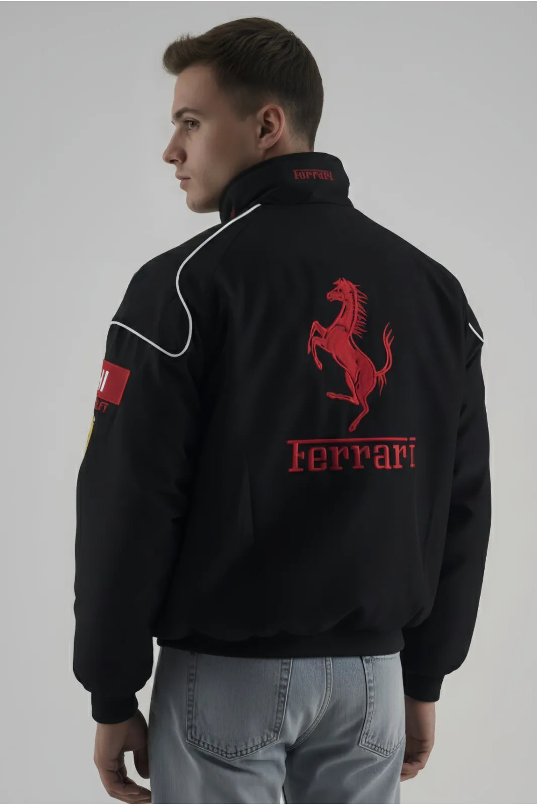 model wearing black ferrari F1 jacket giving back pose 